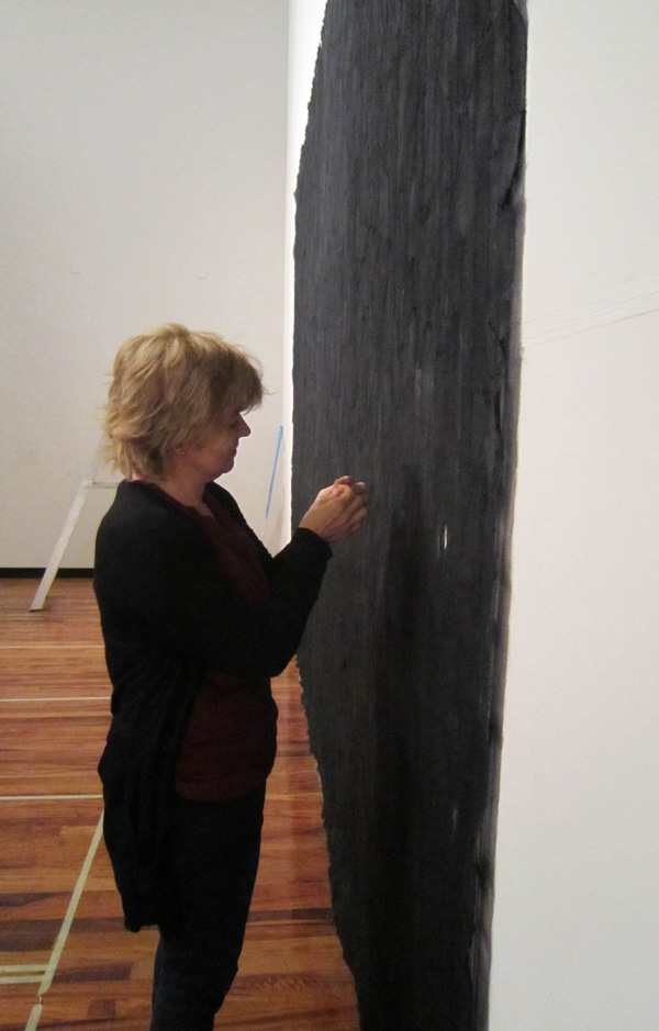 Installing 'remembering, repeating and working through' at Whitworth Art Gallery, 5m x 3m, linen, wax, stitch