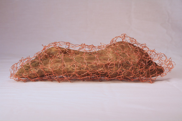 PODS 13, wool, natural dyes, copper, lichen, beeswax, 2012, 3" x 10" x 3" (dimensions variable), hand-felted, stitched, encaustic, crocheted. Photo: Merce Mitchell