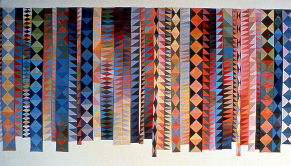 Rags - Variations on a theme, 1989 Modular wall work, 36 strips designed to hang in a random arrangement, any number of strips hang in two directions. This work began a series of explorations of random and variable works based on modular units.