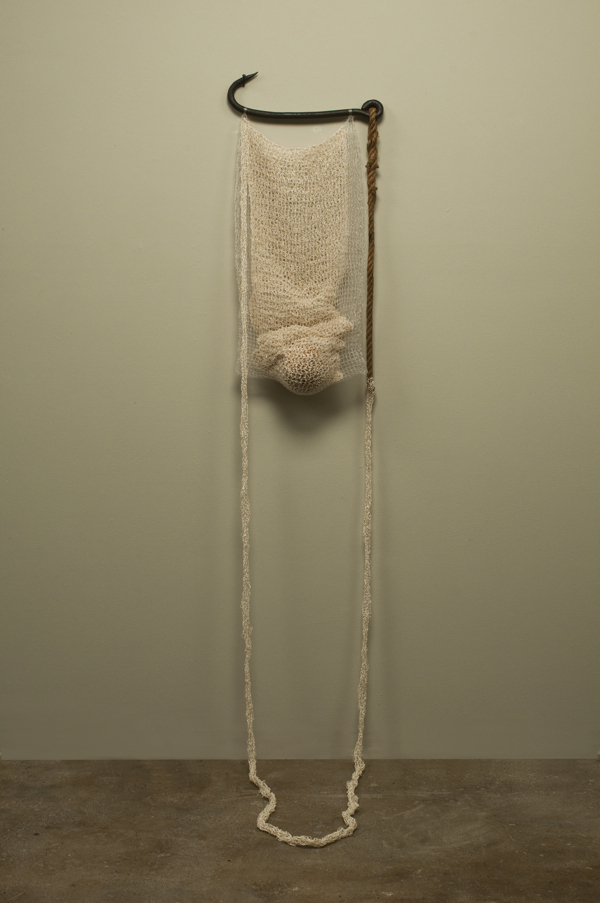 Sack 1, 2011, 76.25" x 14.75" x 7.5", Monofilament, silk, jute, wood, iron. Technique crochet. Photo: John Carlano.