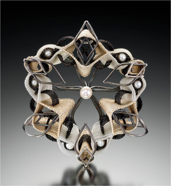 Indelible Brooch, 2009. Fine silver, sterling, nylon monofilament and pearls. Double-cloth on 4 harness floor loom. Hand forged and fabricated jewelry components. 3¼" x 3¼" x 1"