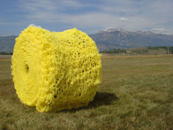 Silage, 52"x48"x52", reclaimed and manipulated water barrier fabric, cotton fabric, found spool, knitting technique, Teton County, Wyoming, 2011