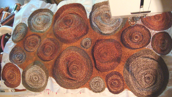 Rings of Time, work in progress, free motion embroidery on water soluble fabric tension and direction manipulation, 12" x 21"