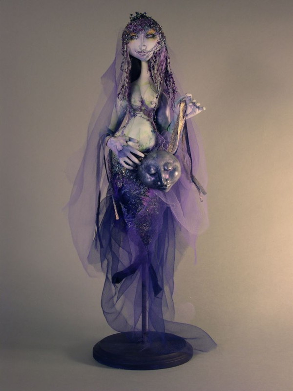 Full Moon, 18" H, hand dyed cottons, silk, lace, chiffon, fabric paint, pencil crayons, beads, paper-clay, wooden stand, ribbon. This piece won the People's Choice Award for the Fibre Art category of the Silver Anniversary Designer's Style Challenge of the Creative Festival, 2012, Toronto, Ontario.