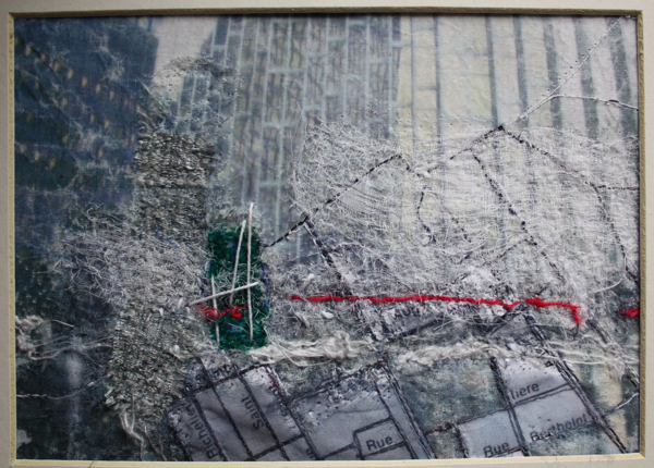 Fragments of Recollection, 8" x 10" matted and framed, Linen, silk, cotton, acrylic paint, metal, needle felting embroidery, raw edge Appliqué. Photo: Karen Goetzinger.