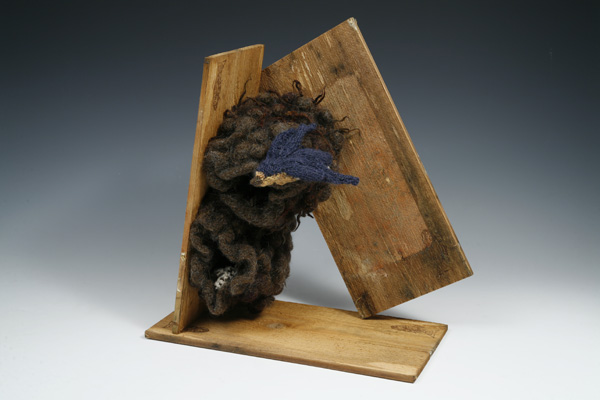 Barn Swallow, 13"h x 14" x 8", Knitted Yarn, Fulled and Sewn, with Nailed Stained Boards