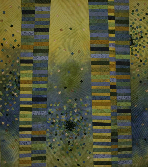 Spring (114 x 126 cm), Materials: cotton, linen, silks, fusible web

After a visit to the quilt days in the Alsace at St-Marie-aux-Mines (FR), I came back full of ideas and of course plenty of purchases. This quilt I thought of already after the first day at the exhibition and I especially went back on the second day to buy matching linen fabrics with the piece I already bought from Heide Stoll-Weber the other day. I was inspired by Ute Baunach to use oblique lines. The squares are of silk and are fixed with fusible web through intensive quilting.