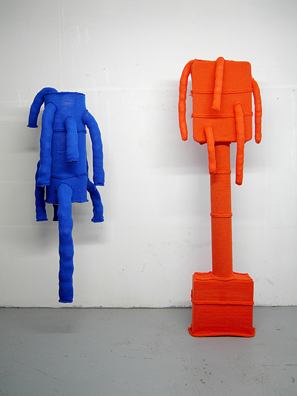 Blue and Orange (Studio Installation), Knitted natural and synthetic yarn, pillow stuffing, various plastic forms and sono tubes, Blue, 76 inches high, 30 inches wide, Orange 84 high, 36 inches wide, 2011. Photo: Andrew MacDonald.