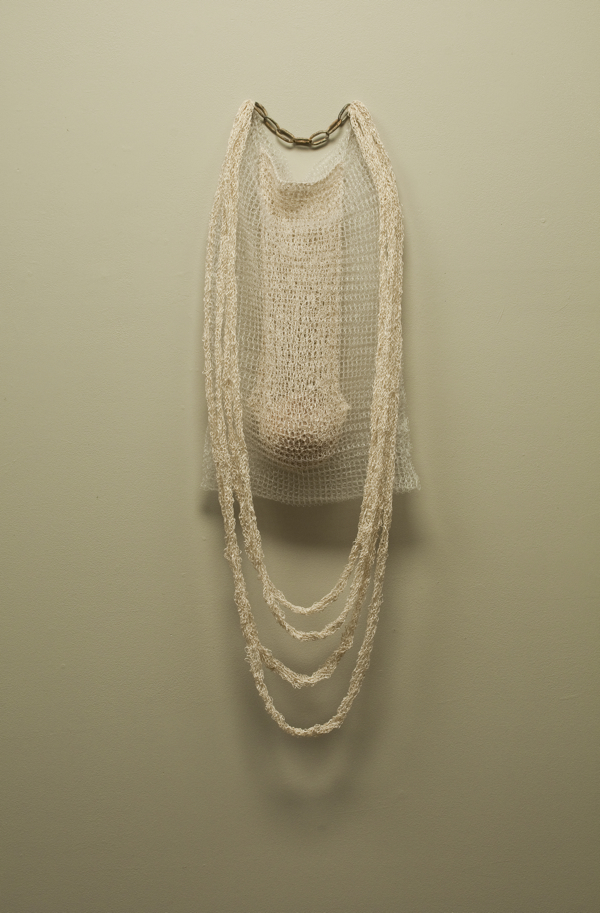 Sack 2, 2011, 41.5" x 14.25" x 5.5", Silk, monofilament, wood, iron. Technique crochet. Photo: John Carlano.