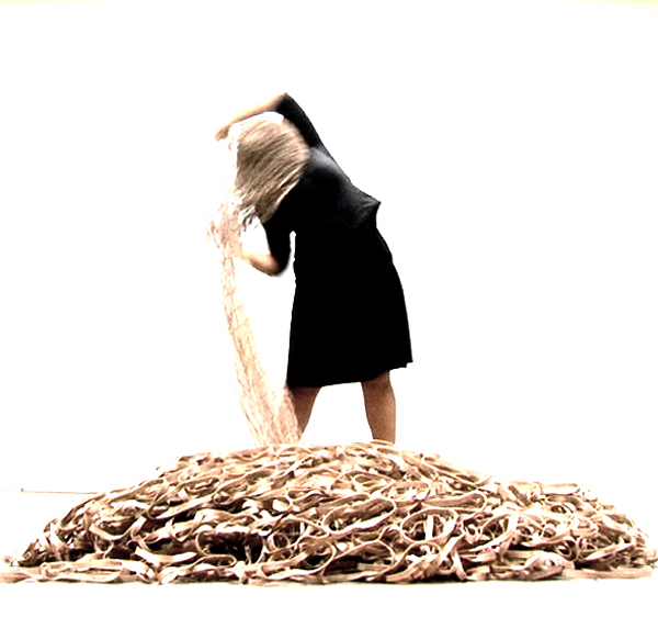 Veiling–Unveiling, 2009 performance and video with elastic net