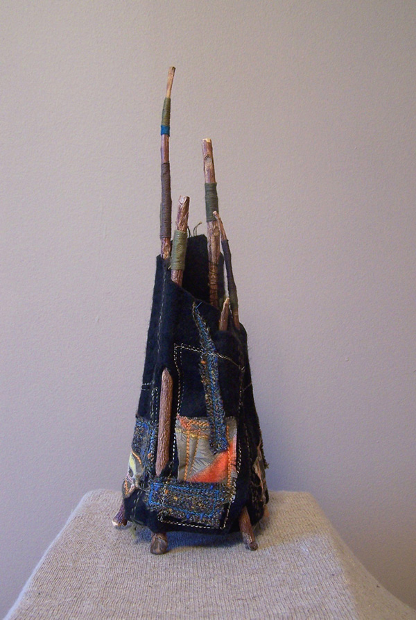 Growing Alone, 2003, 13 ½" x 5" x 5" branches, fabric, yarn, photo: Milena Radeva.