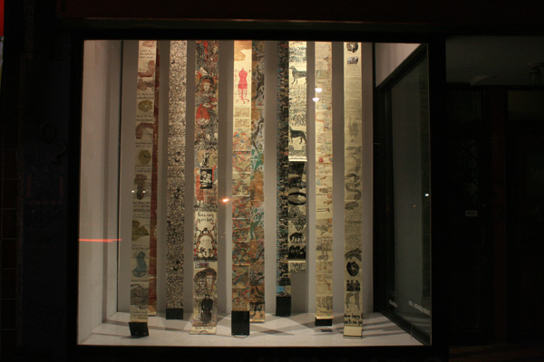 Hanging Books, window installation of mixed media, reversible books, 2011, Mon Ton Window Gallery, Toronto.