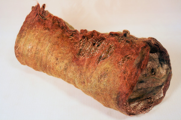 Briza, wool, natural dyes, copper wire, 2010, 6" x 15" x 6", hand-felted, stitched, crocheted. Photo: Merce Mitchell