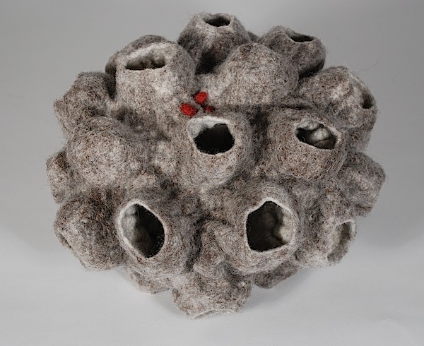 Cocoon 7, wool, porcupine quills, wet felting, hand dyeing, Shibori (tying). Photo: Carmella Karijo Rother