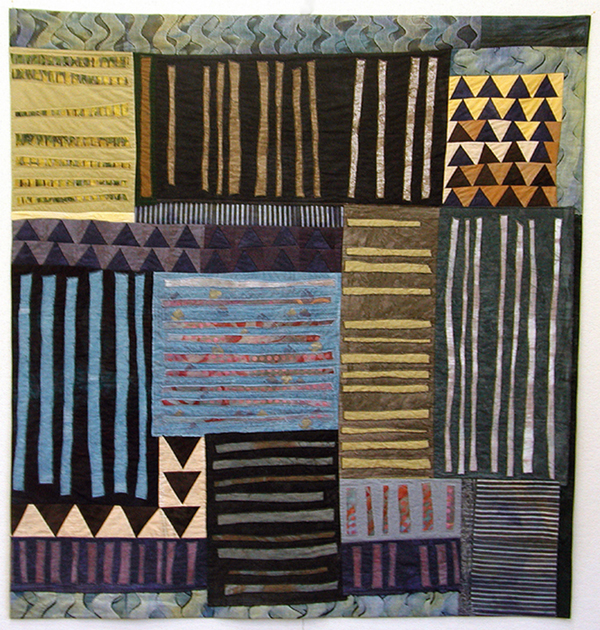 Summer in Seville, 57" x 60", Quilt. Cotton, dyed, painted, reverse appliqué, machine pieced, machine quilted. Photo: David Caras