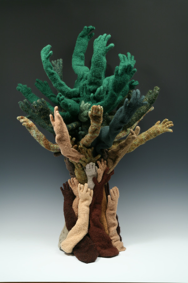 Reaching Green, 34"H x 24"W x 23"D, Knitted Wool, Fulled and Sewn, on artist made armature