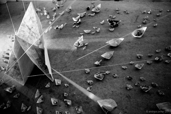 The rats... (1, 2 & 3), different sized ships made of paper: 5cm x 5cm to 15cm x 15cm, and on hand felted ship about: 50cm x 100cm, felt made of Merino Wool, Cotton Fabric and transfer print, Photo: Andrea Peller, 2011