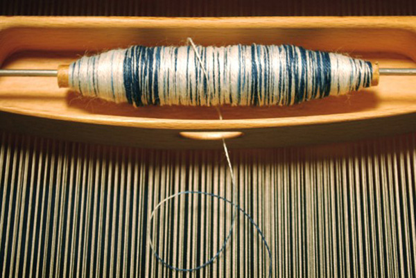 Noise 1204 on the loom, Hemp weft thread dyed with indigo using kasuri technique. Photo: M Kelly-Frère.