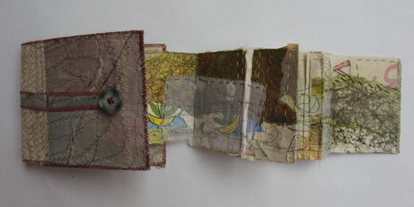 West Dean Mapping. Book form with old book pages and domestic fabrics. Stitch, dye, drawing. 70X12x12cm. (private collector). Photo: Cas Holmes.