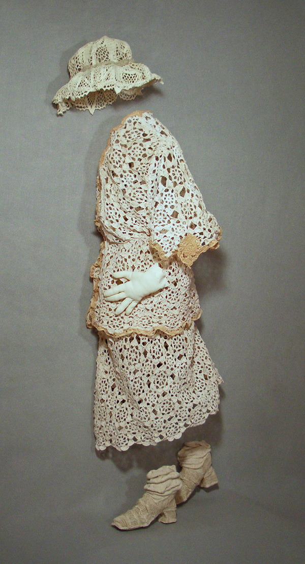 Getting On, 2009, 59"H x 24"W x 15"D, Mixed Media Relief Sculpture:  Reconstructed cotton crochet tablecloth combined with new knitting and crochet over wire armature