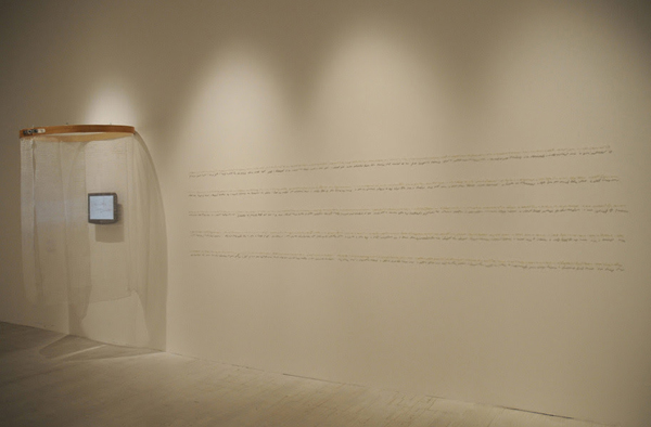 Lies, lies, lies…, Triennale di Milano Museum, Milan, Italy. Collected and embroidered lies, pins, shadows, lying booth (fabric screen-printed with collected lies, hand-made oversized embroidery hoop, video), 2004/2009, 96"H x 355"W x 1½"D, embroidery, screenprint. Photo: Simon Hermant.