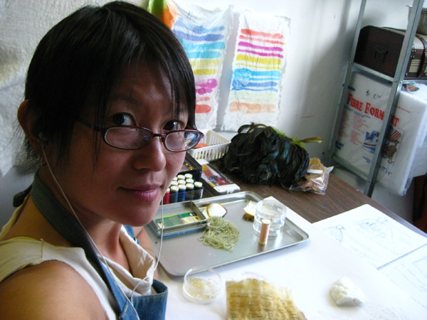 Emily Jan working in her studio at Concordia University's Fine Art MFA program