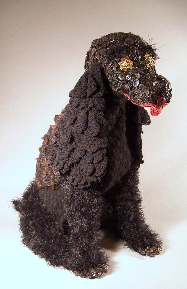 Ripples, 2010, 25"H x 14"W x 23"D, Mixed Media Sculpture:  Wool, rayon, cotton, wire, buttons, new crochet, knitting and buttonwork over wire armature, combined with recycled fulled felt sweater knitted by artist during her teen years.