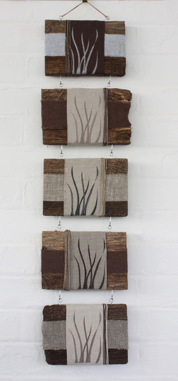 Structure, 2009, 9" x 32", block printed linen, linen and cotton string, hand stitched and wrapped over salvaged fencing wood, photo: Lotta Helleberg