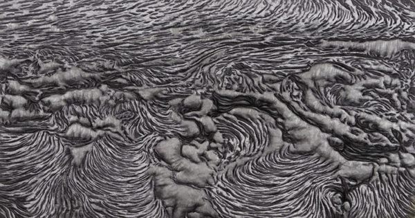 Lava Flow, 26" x 50", 2010, Materials: Digital image on cotton , archival pigment based inks, metallic acrylic paints, coloured pencils, unbleached cotton, Setacolor fabric paints, assorted threads, needle-punch polyester batting, Techniques: Digital photo transfer, fabric painting, quilting, Photo: Carolyn Pihach  (Original digital photo by David Baird)
