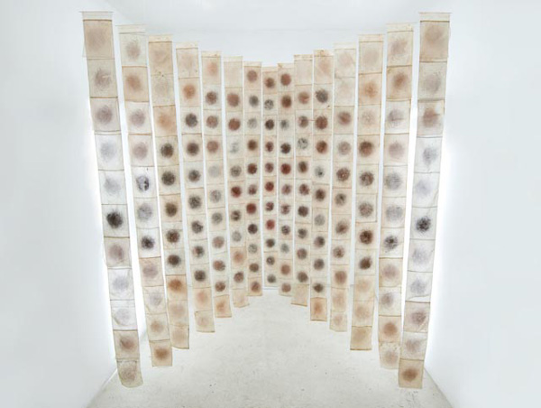 "Prayer", 15, ten foot hanging banners, screenprinting ink, photocopied journal entries, wire, sewn fabric, 10 x 12 x 8 ft, 2009.