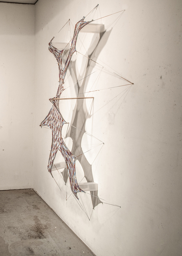 Stretched to my limits, how soon is now (Detail), Left work, yellow: 79 inches high x 36 W x 18 D, Right work: 90 inches high x 42 W x 18 D, Knitted yarn, wood, nails, 2013. Photo: Andrew MacDonald.