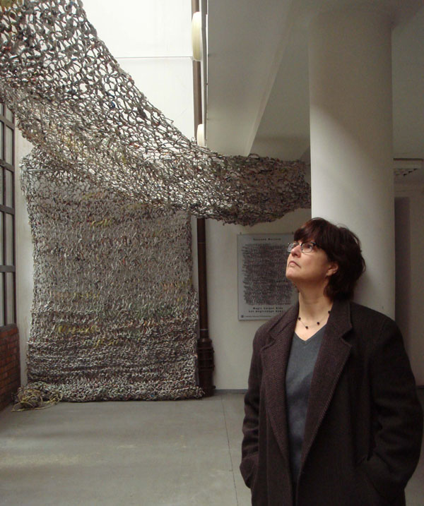 Artist: Suzanne Morlock with Magic Carpet Ride, 80'x12'x15', newspaper, spinning technique and knitting technique, Lodz, Poland, 2011