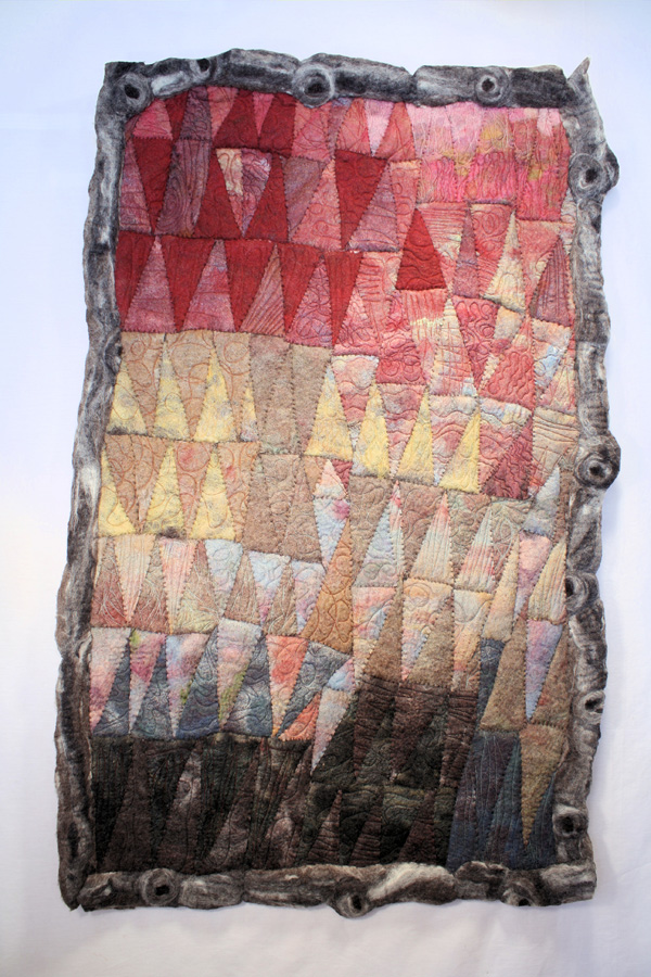 Defragmentation, wool, thread, natural dyes, 2009, 59" x 37", hand-felted, hand-stitched construction. Photo: Merce Mitchell