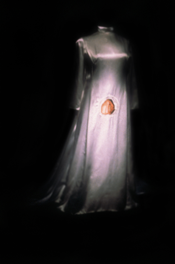 Freud's Bride, 60 x 16 x 30, 1996, Found satin dress, hand embroidery, armature. installation at Duke-u-menta, Toronto. Photo: Simon Glass.