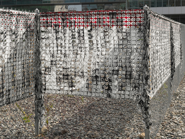 Fence/Curtain 1.0 (detail), Temporary site specific art installation in Cambridge, MA, USA, 100% cotton, paint, Monoprinted, handstamped, handpainted, stitched, cut stiffened fabric, Photo credit: Will Howcroft.