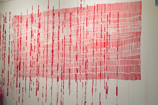 Flow, machine sewn Rubylith® suspended in f