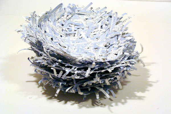 Earnings (from 2003 monthly), 2009, shredded paper, thread, installed dimensions 92 x 92 cm, each form approximately 19 x 19 cm
