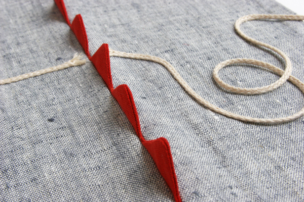 Detail: Cutting Edge (Idiom Series), 12w" x 16"h, Rope on linen, Machine stitched with hand sewn embroidery, Photo: Kathryn Clark