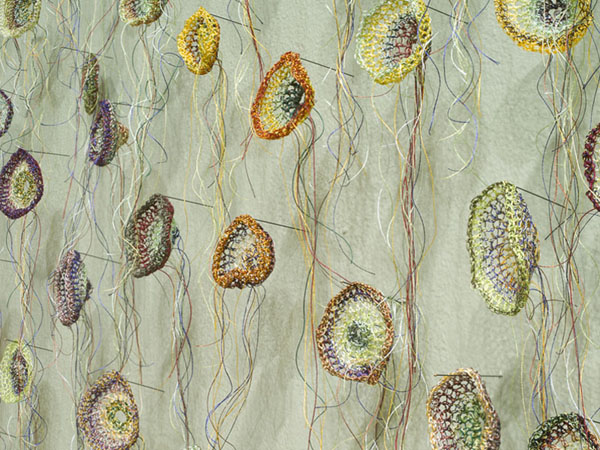 They Keep on Growing, detail, thread & insect pins, 2013, crochet, installation: Schweinfurth Art Center, Auburn, New York, USA, 2" crochet circler forms.
