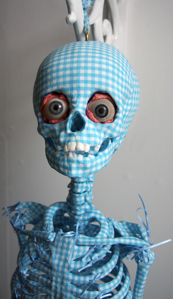 Hansel, 2010. Gingham fabric, cast skeleton, glass eyes, bubble gum. Photo: Catherine Heard