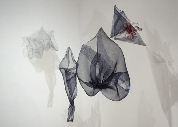 Weightless, suspended installation of commercial wire mesh organically shaped forms – as a result of a group exhibition called: Art and Industry with the York Arts Center, York, PA. Five artists were selected to work alongside manufacturers in the northeast US to create art pieces with their commercially manufactured products. (In my case a screen company called New York Wire Company) 2008. Photo: Cathy Breslaw.