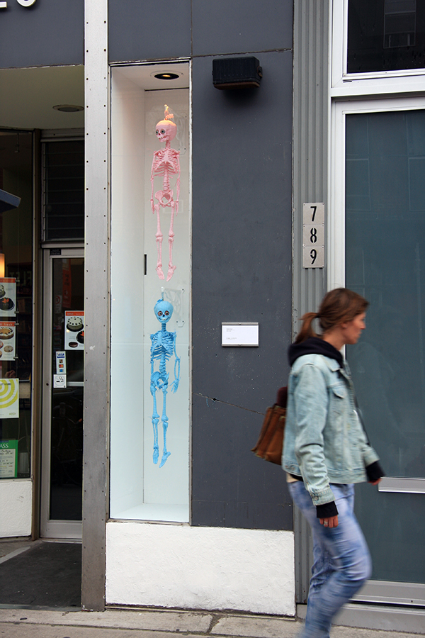 Hansel and Gretel, 2010. Gingham fabric, cast skeleton, glass eyes, bubble gum. Installation at Queen Specific, Toronto. Photo: Catherine Heard.