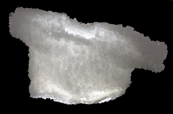 Crystal Tee Shirt, alum, 2009, grown crystals, 9" x 15.5" x5.5", photo: David Broda.