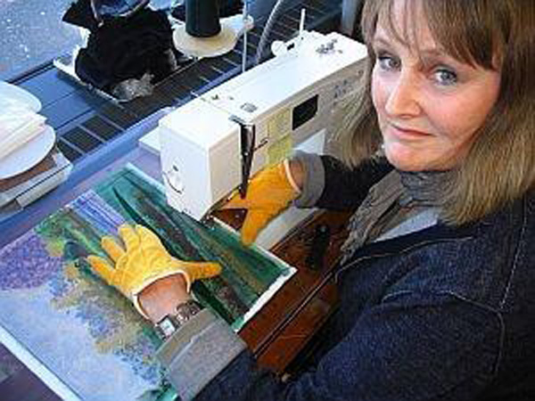 Pat in studio at sewing machine