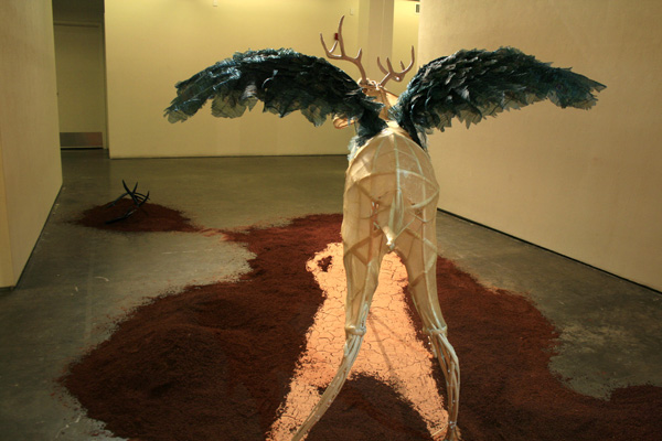The peryton, shown at the Bruce Galleries, CCA San Francisco, from the exhibition far from god (solo show), (rear view), 2009, installation dimensions variable, materials: hog gut, reed, hand-screenprinted textiles, clay, soil, resin, polymer clay, techniques: casting, screenprinting.