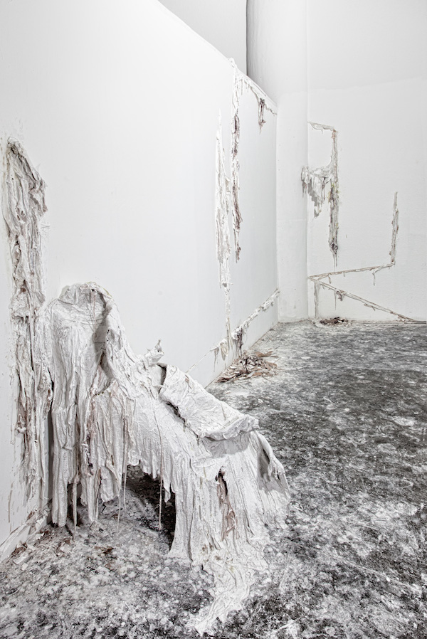 Into the Cut, 2011, 8’H x 15’W, plaster, chicken wire, alpaca wool, gesso, ink, rubber latex. Technique: Cutting directly into the gallery wall, then filling the cracks with plaster & alpaca wool, then creating a 3D armature with chicken wire & plaster. Photo: Josh Band