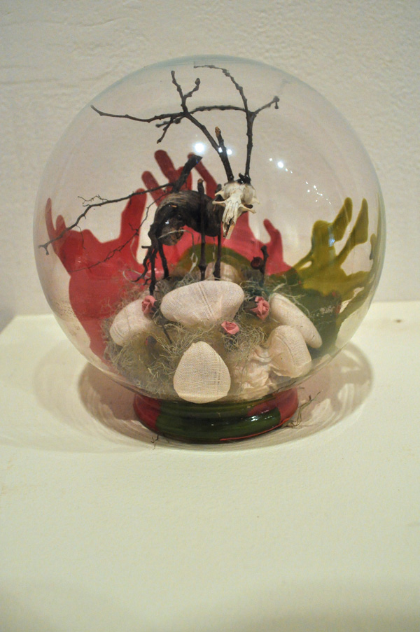 Animal, Vegetable, Mineral, 2009, 8" x 8" x 8", materials: found wood, moss, and rodent skull, cotton (shibori/lye), craft flowers, acrylic paint, glass.