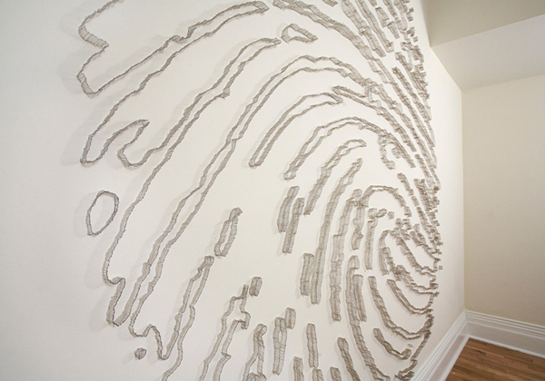 Thumbpins (mid-range view), Gladstone Hotel, Toronto, ON. Dressmakers' pins pinned directly to the hotel room wall, 2007, 100"H x 96"W x 1 1/2"D, pinning. Photo: Lightleak Media.