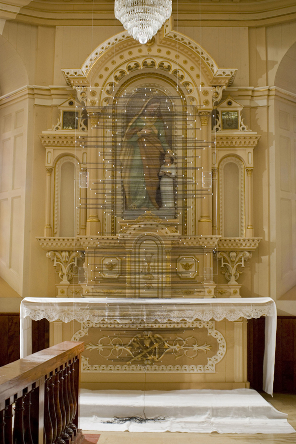 Transmission, site-specific installation for the Biennale Internationale du Lin, Portneuf, QC. Thread wound around acrylic rods on interconnected laser-cut acrylic panels, hardware, 2009, 106"H x 48"W x 1 1/2"D, threading. Photo: Idra Labrie.