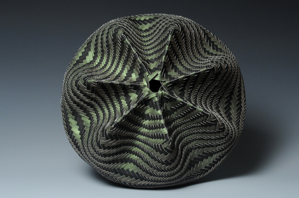 Mountain Swell, detail, watercolor paper, acrylic paint, waxed linen thread, 2009, 12 x 15 x 15", undulating diagonal twill woven basketry, sewn rim, Photo: Ken Rowe
 